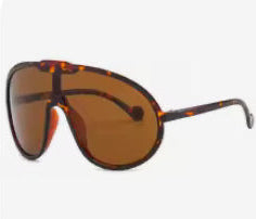 Sunglasses with brown lenses and tortoiseshell frame on a white background