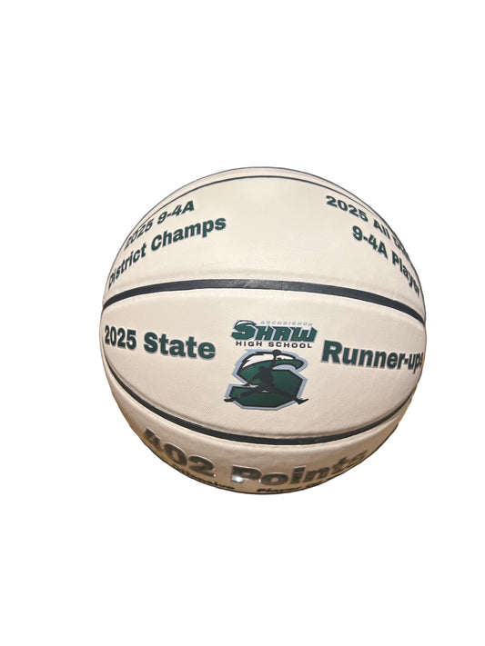 Basketball with text and logo on a marble surface